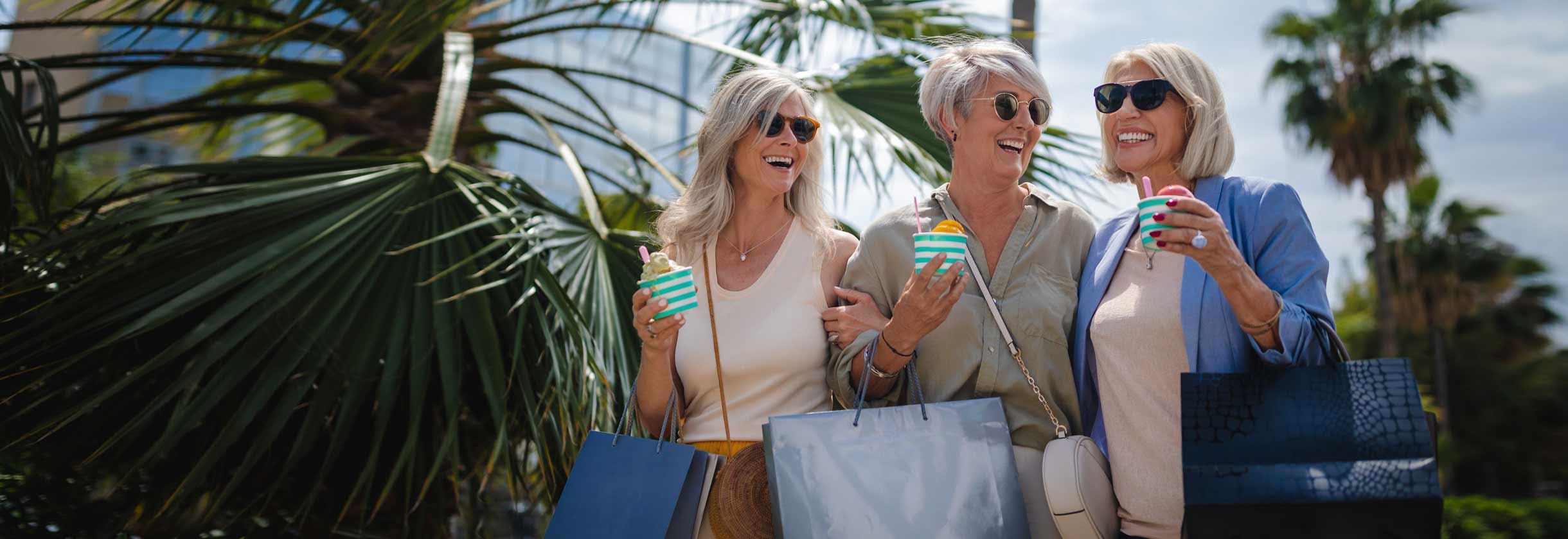 A group of woman enjoying ice cream and shopping